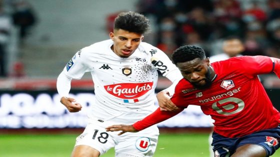 Jonathan IKONE of Lille, Azzedine OUNAHI and Vincent MANCEAU of Angers during the Ligue 1 match between Lille and Angers on November 6, 2021 in Lille, France. (Photo by Catherine Steenkeste/Icon Sport via Getty Images)