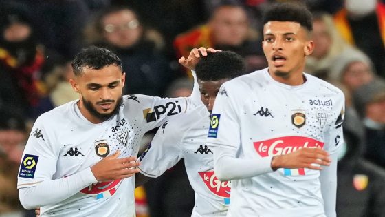 LENS, FRANCE - NOVEMBER 26: Sofiane Boufal of Angers SCO celebrates scoring his side's first goal during the Ligue 1 Uber Eats match between RC Lens and Angers SCO at Stade Bollaert-Delelis on November 26, 2021 in Lens, France. (Photo by Sylvain Lefevre/Getty Images)